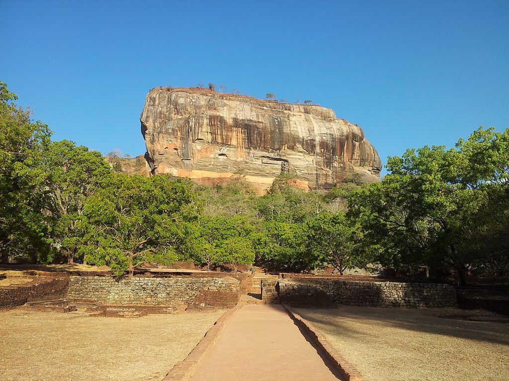 Sigiriya Rock | Image Credit: <a href="https://commons.wikimedia.org/wiki/User:Shashishekhar">Shashi Shekhar</a>, <a href="https://commons.wikimedia.org/wiki/File:The_Lion_Rock,_Sigiriya,_Sri_Lanka.jpg">The Lion Rock, Sigiriya, Sri Lanka</a>, <a href="https://creativecommons.org/licenses/by-sa/3.0/legalcode" rel="license">CC BY-SA 3.0</a>